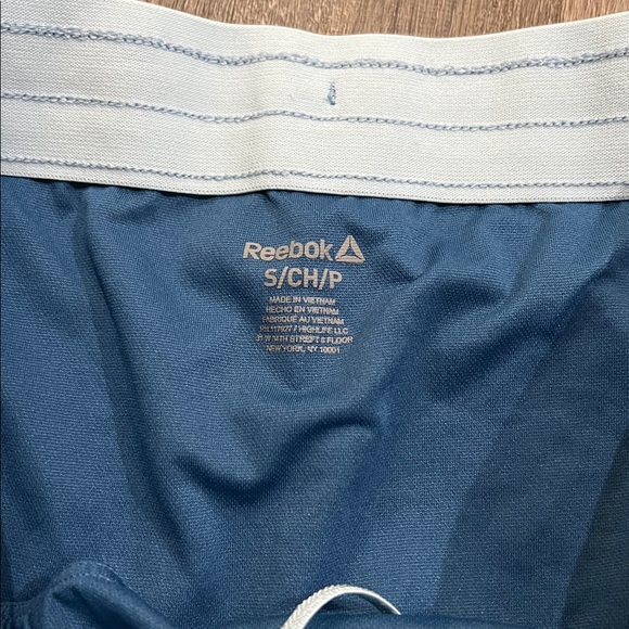 (19) Reebok Navy Patterned Running Shorts - Picture 4 of 5